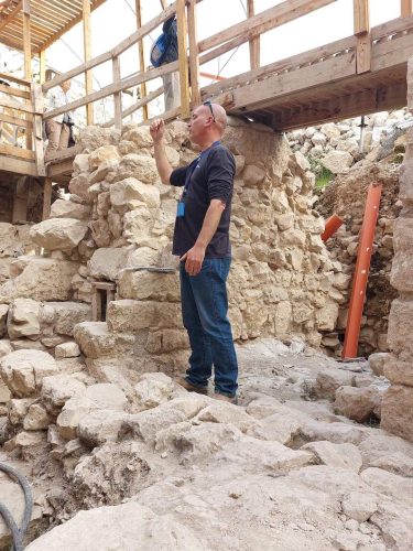 Dr. Yiftah Shalev shows us around the excavations at the Givati Parking Lot site, on the northwestern side of the Old City. (Photo by M. van den Berg)