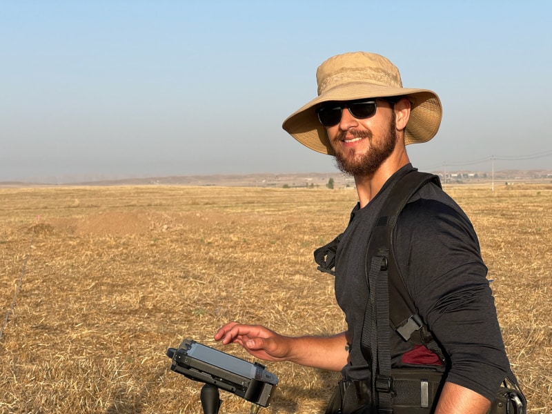 Luke operating the magnetometer.