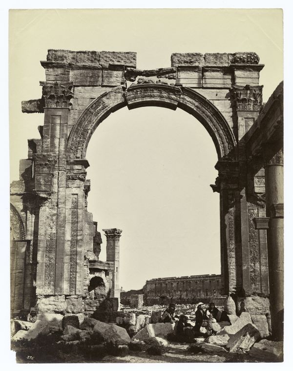 Ruins of the monumental street arch at Palmyra, author unknown, c. 1900 CE. Image courtesy of The Miriam and Ira D. Wallach Division of Art, Prints and Photographs: Photography Collection, The New York Public Library. TMS Object Number: 101PH020.171