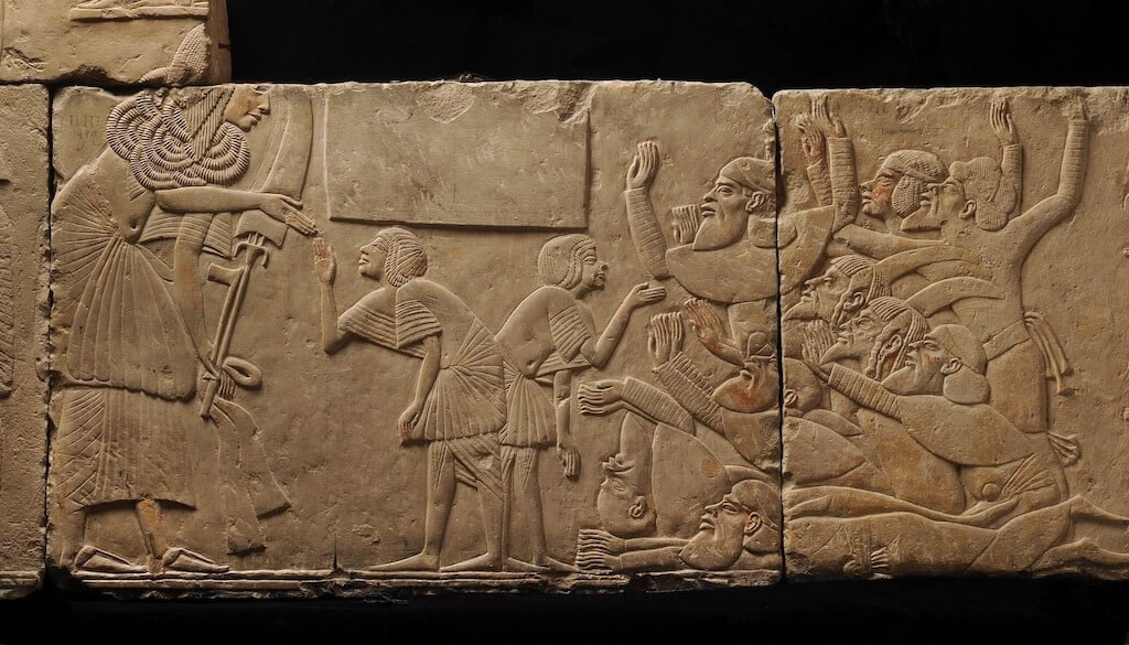 Foreign envoys from Libya and the Near East bow and scrape before Horemheb. Relief from his tomb in Saqqara, ca. 1333–1323 BC. Photo courtesy of the National Museum of Antiquities, Leiden. CC0 license.