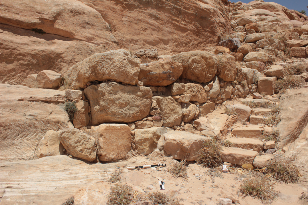 Figure 6 Possible Iron Age wall under Nabataean features of the ‘Dionysian Hall’ at Bayda.