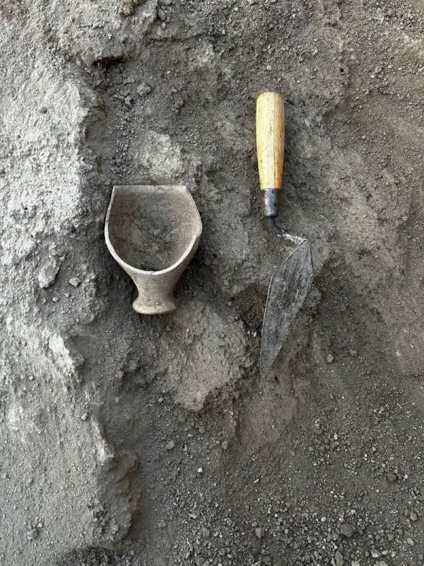 Photo 2: A near complete goblet found within some fill early in the season