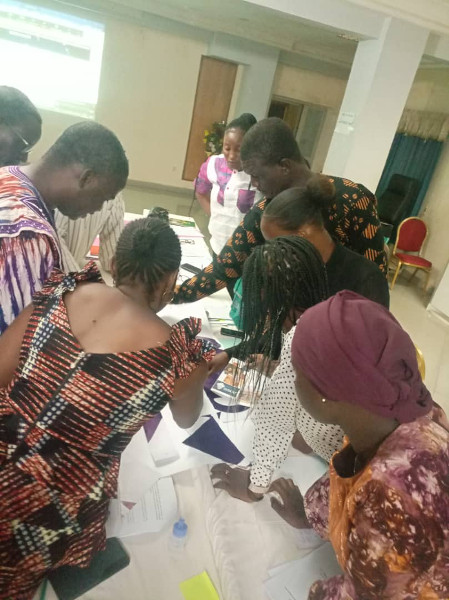 Attendees work together to solve a puzzle during the workshop.