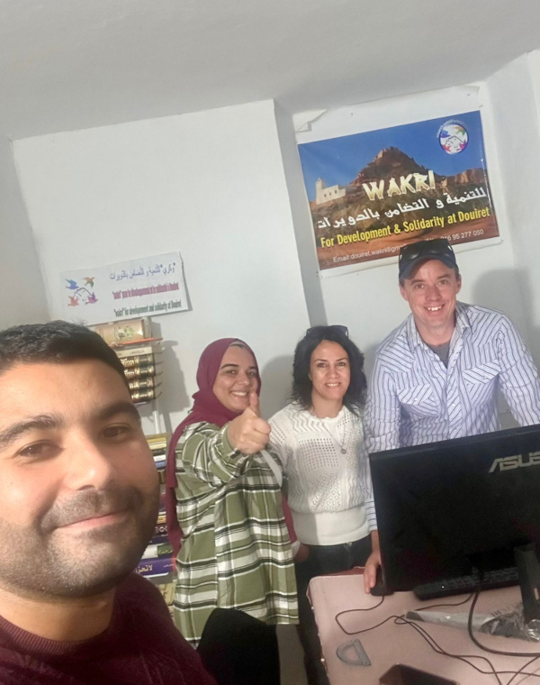 Project personnel working on the preparation of baseline documentation after field assessment at the Douiret Women’s Association (Wakry Association); from right to left: Will Raynolds (ASOR), Ibtissem Sabri, Assia Sabri, Safwan Tlili. Photo Credit: ASOR.